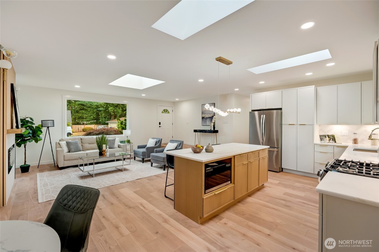 Reworked kitchen with a new island and quartz counters